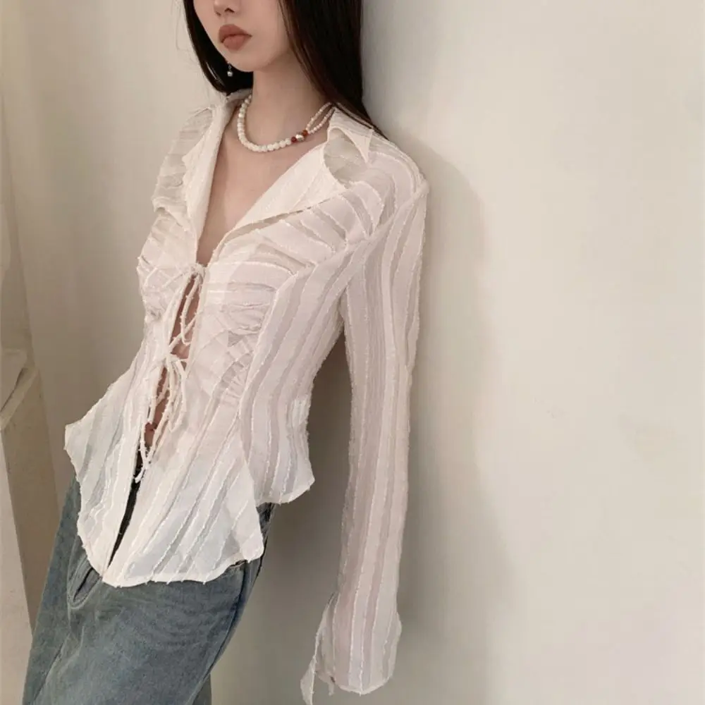 Шифоновая солнцезащитная рубашка с v-образным вырезом и вырезом на шнуровке, нестандартная рубашка с длинными рукавами, свободная бежевая рубашка с рюшами, женская повседневная рубашка
Шифоновая солнцезащитная рубашка с v-образным вырезом и вырезом на шнуровке, нестандартная рубашка с длинными рукавами, свободная бежевая рубашка с рюшами, женская повседневная рубашка