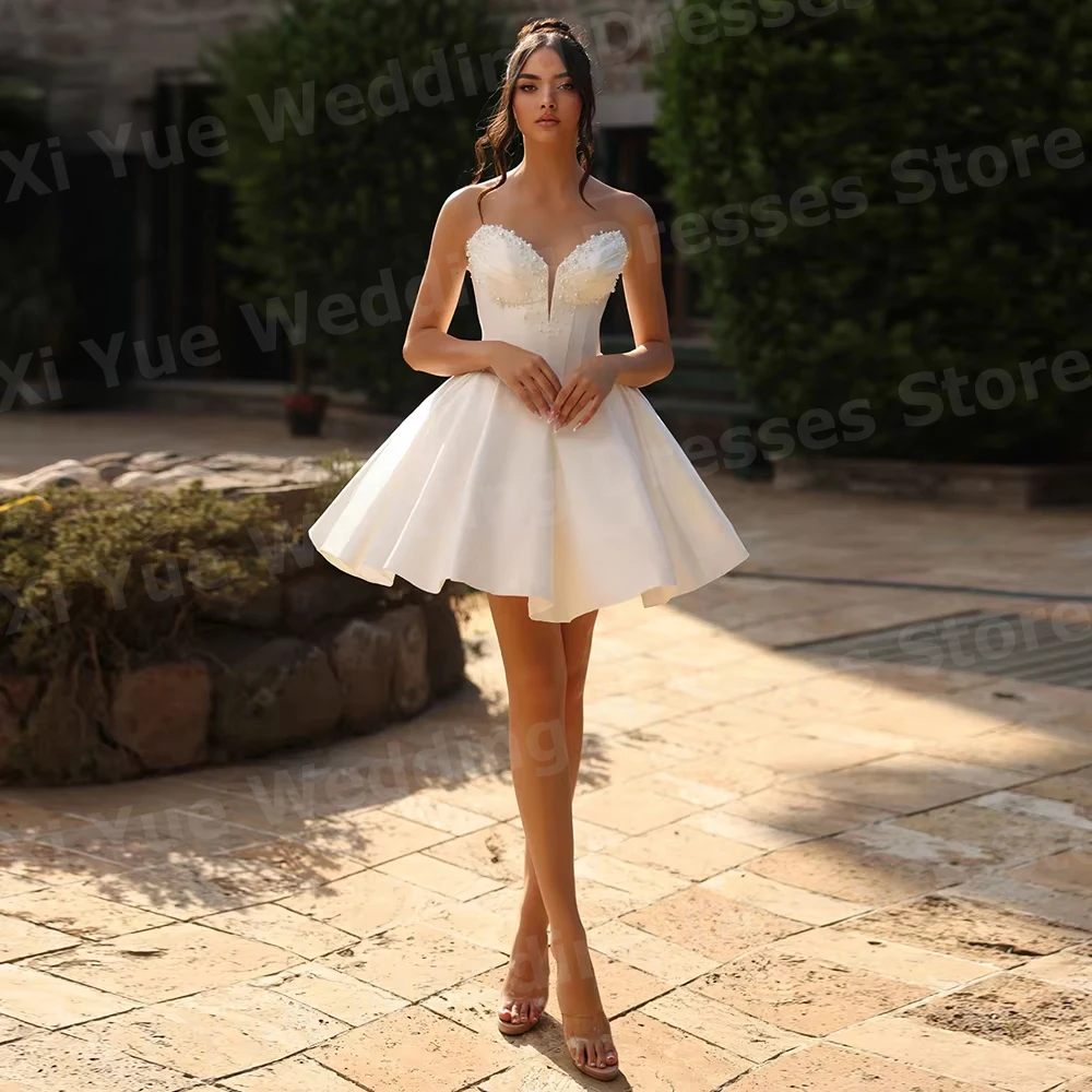 2026 Simple Mini A Line Women's Beaded Sleeveless Satin Wedding Dresses Vestido De Novia Bride Gowns Customized Robe De Mariée
2026 Simple Mini A Line Women's Beaded Sleeveless Satin Wedding Dresses Vestido De Novia Bride Gowns Customized Robe De Mariée