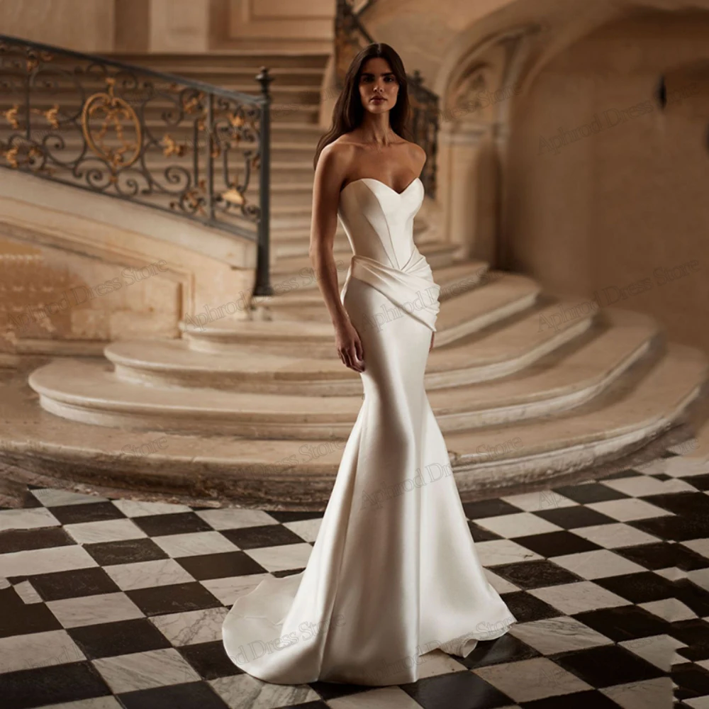 Очаровательные свадебные платья, сексуальные свадебные платья, атласные халаты без бретелек с открытой спиной для официальной вечеринки, элегантные платья Vestidos De Novia по индивидуальному заказу 
Очаровательные свадебные платья, сексуальные свадебные платья, атласные халаты без бретелек с открытой спиной для официальной вечеринки, элегантные платья Vestidos De Novia по индивидуальному заказу