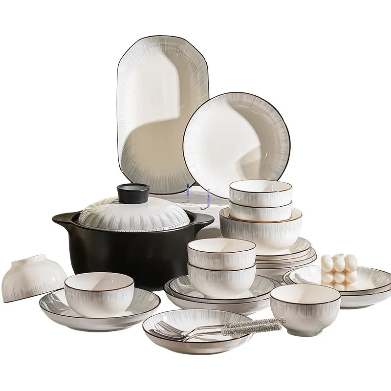 Household dishes and kitchen utensils Ceramic rice bowls and plates combination Simple Japanese-style ceramic
Household dishes and kitchen utensils Ceramic rice bowls and plates combination Simple Japanese-style ceramic