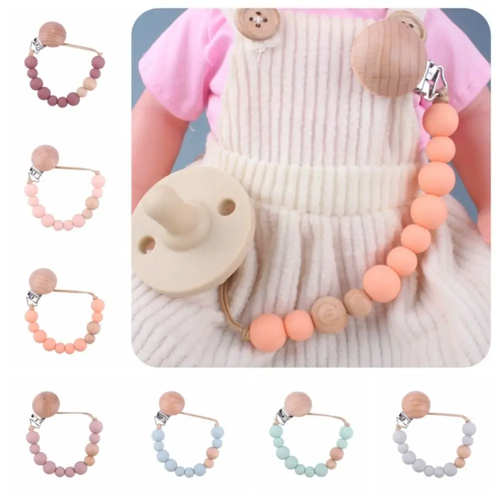 Dummy Clips Pacifier Holder Clips Wooden Bead Soother Holder Baby Pacifier Chain Nipple Holder Clips Round
Dummy Clips Pacifier Holder Clips Wooden Bead Soother Holder Baby Pacifier Chain Nipple Holder Clips Round