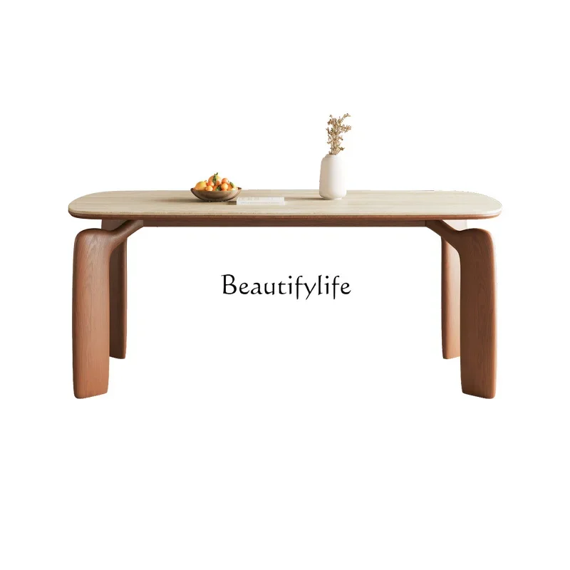 French medieval solid wood travertine dining table household modern simple elephant rock table
French medieval solid wood travertine dining table household modern simple elephant rock table
