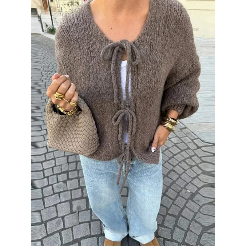 Fashion casual brown lace up bow knitted cardigan o-neck long sleeve hollow out sweater 2024 autumn female high street knitwear
Fashion casual brown lace up bow knitted cardigan o-neck long sleeve hollow out sweater 2024 autumn female high street knitwear