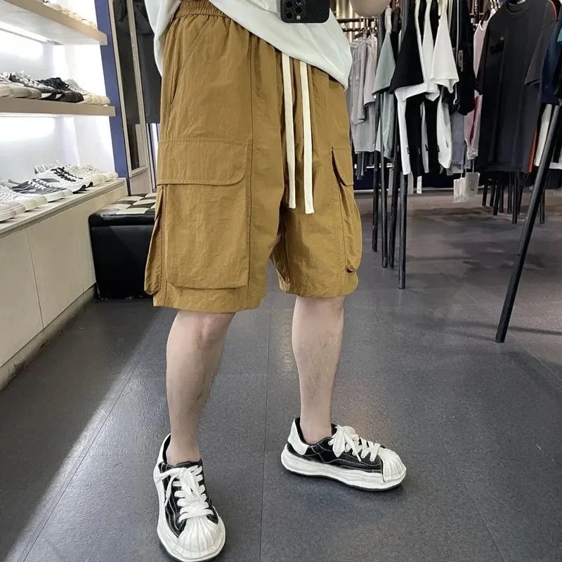 Men's shorts Summer New Ins Baggy Pants Fashion Casual Pants Korean Quick Dry Five Quarter Cargo Pants Men Clothing Short Homme
Men's shorts Summer New Ins Baggy Pants Fashion Casual Pants Korean Quick Dry Five Quarter Cargo Pants Men Clothing Short Homme