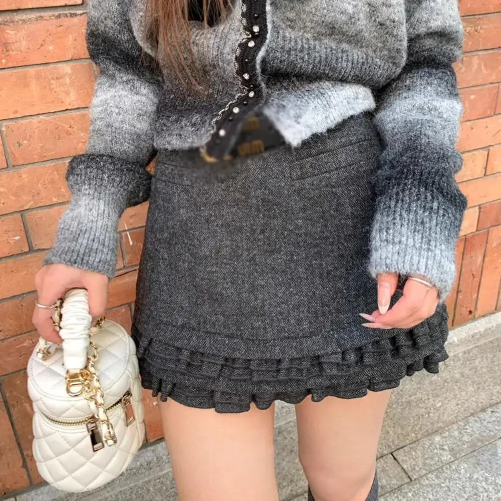 Женская элегантная многослойная шерстяная короткая юбка трапециевидной формы с оборками, женская осенне-зимняя однотонная тонкая мини-юбка с высокой талией
Женская элегантная многослойная шерстяная короткая юбка трапециевидной формы с оборками, женская осенне-зимняя однотонная тонкая мини-юбка с высокой талией