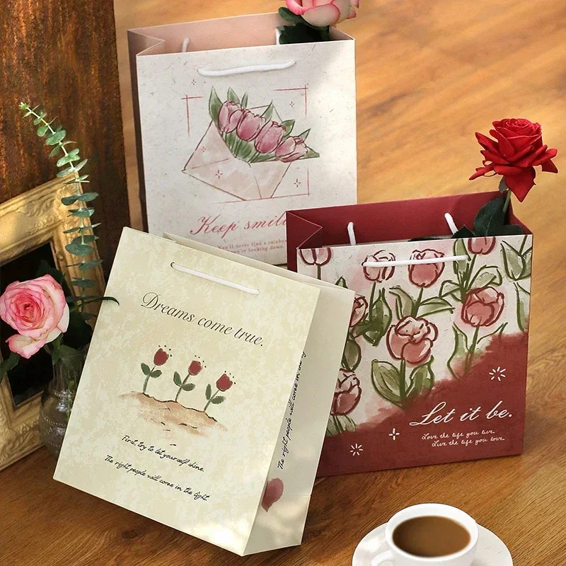 Multiple Rose Gift Packaging Bags with Hand Gifts High Grade Paper Bags for Students' Handheld Birthday Packaging Paper Bags
Multiple Rose Gift Packaging Bags with Hand Gifts High Grade Paper Bags for Students' Handheld Birthday Packaging Paper Bags