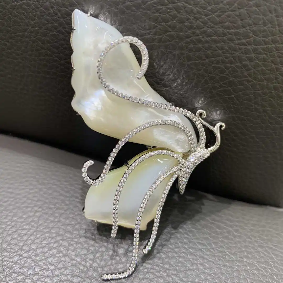 natural sea shell butterfly brooch 925 sterling silver with cubic zircon fashion women jewelry free 70*40MM
natural sea shell butterfly brooch 925 sterling silver with cubic zircon fashion women jewelry free 70*40MM