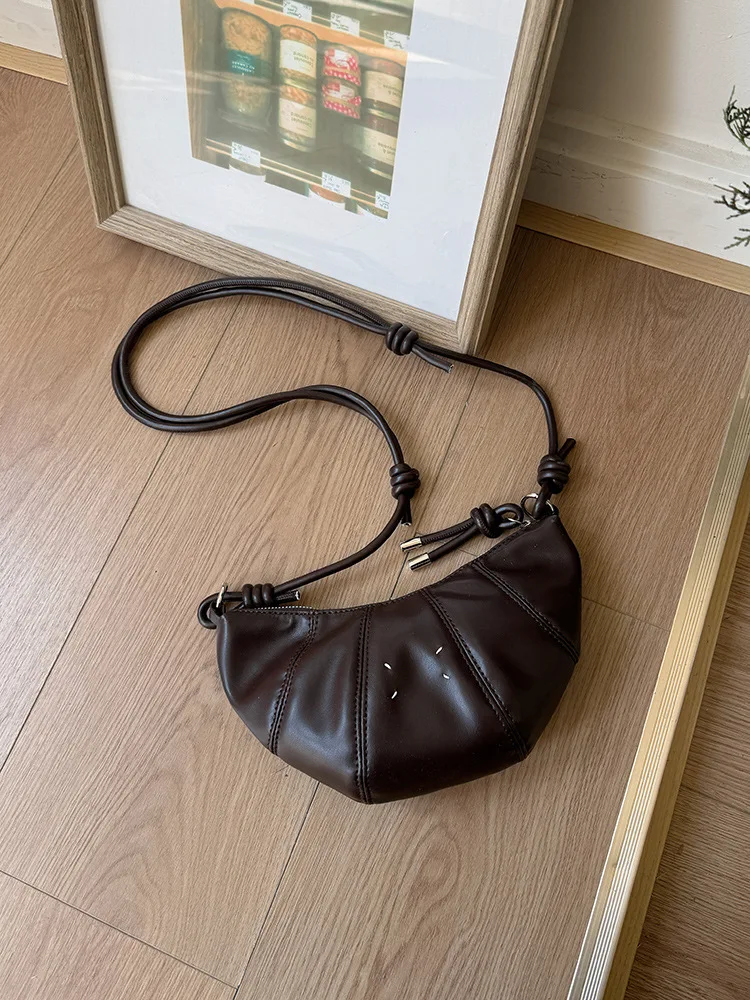 2025 женская новая простая мини-сумка через плечо с круассаном, повседневная универсальная легкая сумка для пельменей, сумка через плечо
2025 женская новая простая мини-сумка через плечо с круассаном, повседневная универсальная легкая сумка для пельменей, сумка через плечо