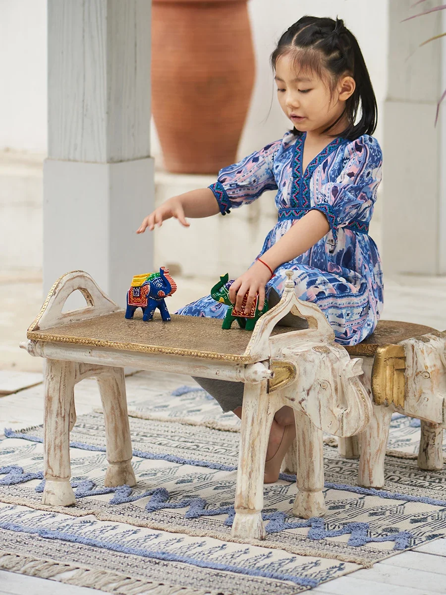 Indian handmade elephant small stool creative living room Internet celebrity stool Solid wood children's shoe changing stool Cam
Indian handmade elephant small stool creative living room Internet celebrity stool Solid wood children's shoe changing stool Cam