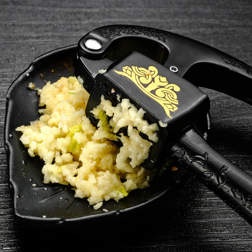 Manual Garlic Presser Zinc Alloy H held Masher Black Color Multipurpose Kitchen Veggie Tool Gadgets Mincing Device
Manual Garlic Presser Zinc Alloy H held Masher Black Color Multipurpose Kitchen Veggie Tool Gadgets Mincing Device