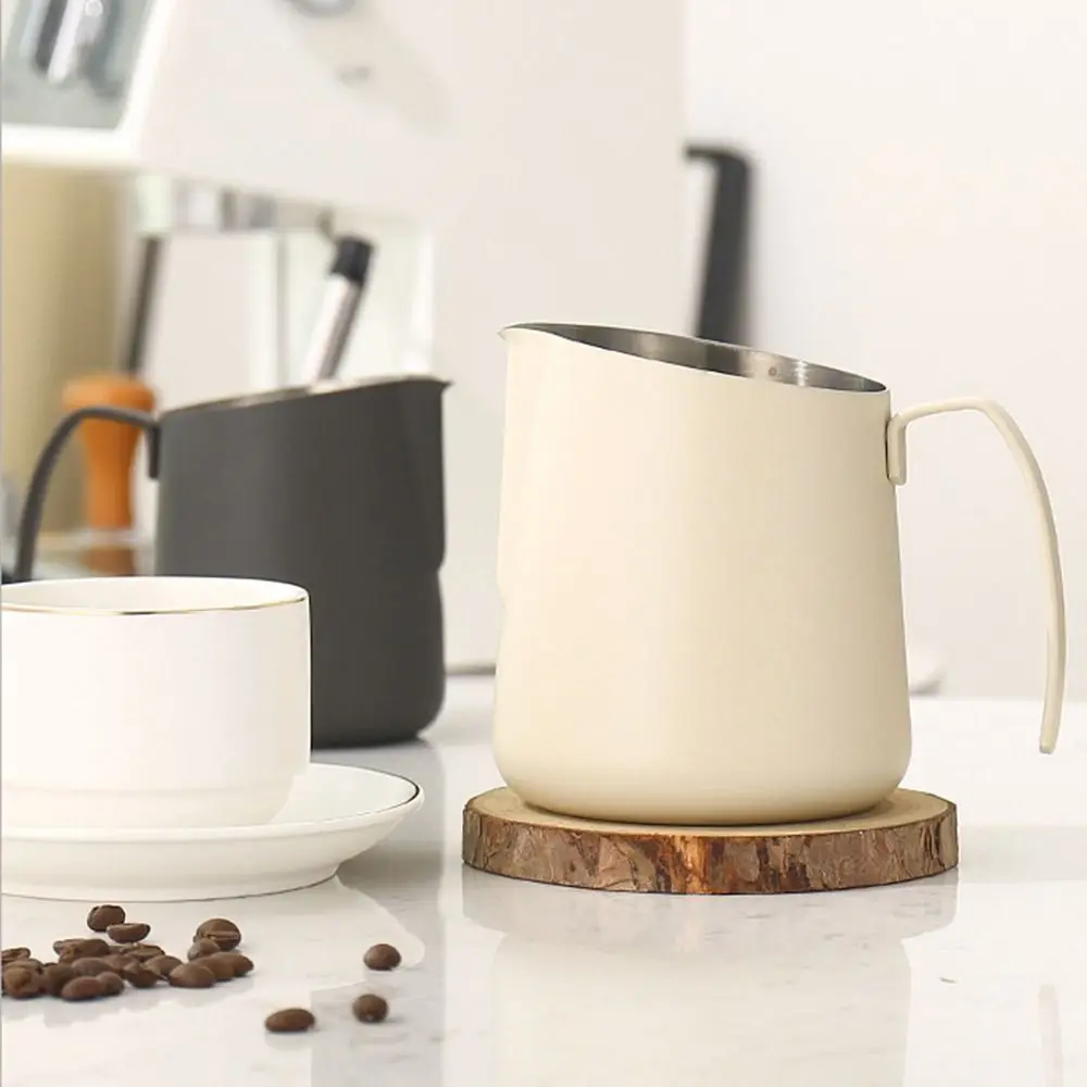 Stainless Steel Milk Frothing Pitcher 500/750ml Long Rounded Spout Milk Foam Cup Clear Scale V-Mouth Design Latte Art Jug 
Stainless Steel Milk Frothing Pitcher 500/750ml Long Rounded Spout Milk Foam Cup Clear Scale V-Mouth Design Latte Art Jug