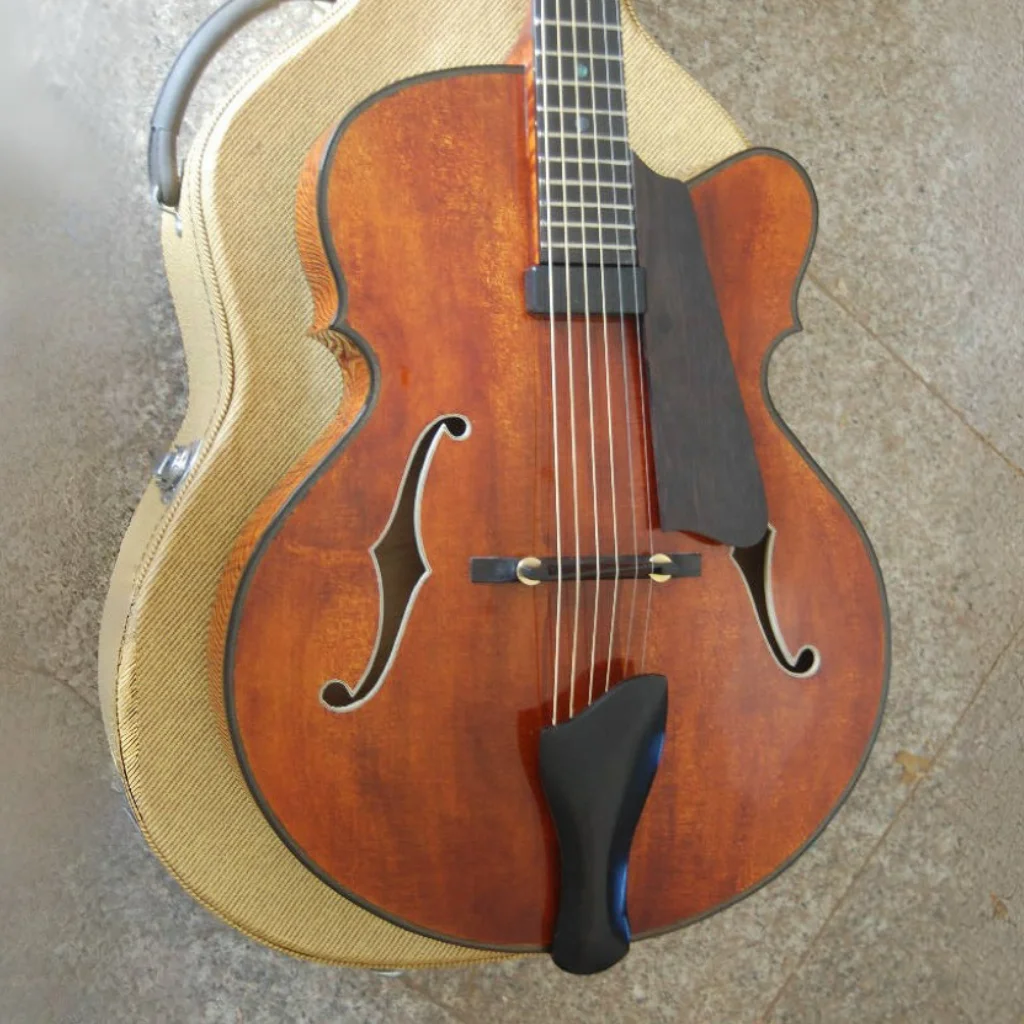 Yunzhi Fully Handmade Jazz Electric Guitar with Hollow Body Carved Maple Ebony Fingerboard Spruce Material
Yunzhi Fully Handmade Jazz Electric Guitar with Hollow Body Carved Maple Ebony Fingerboard Spruce Material