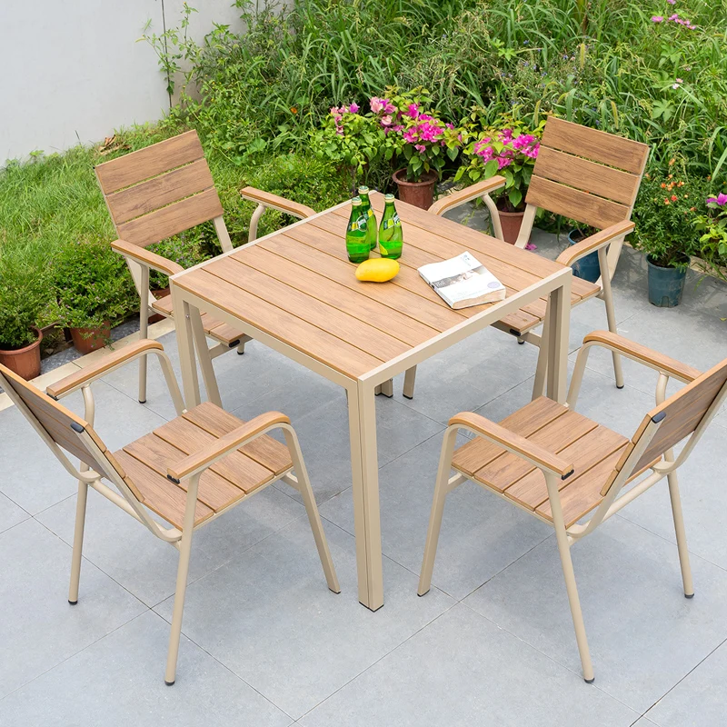 Открытый пластиковый деревянный стол и стул, комбинация двора, отдыха на открытом воздухе, балкон, водонепроницаемый и антикоррозийный сад
Открытый пластиковый деревянный стол и стул, комбинация двора, отдыха на открытом воздухе, балкон, водонепроницаемый и антикоррозийный сад