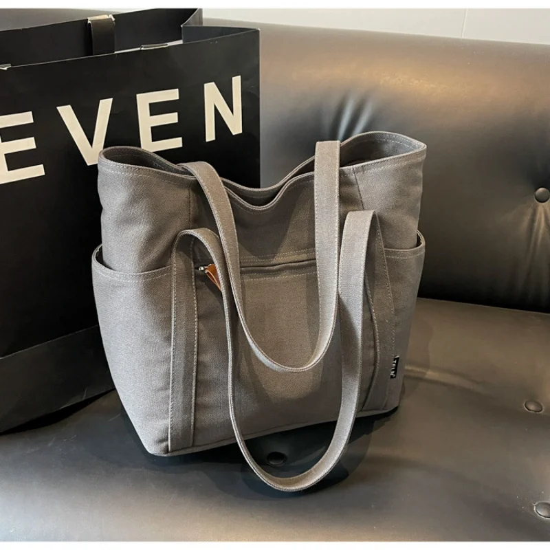 Женская сумка большой емкости с несколькими внешними карманами на молнии, сумка через плечо, студенческая сумка для покупок
Женская сумка большой емкости с несколькими внешними карманами на молнии, сумка через плечо, студенческая сумка для покупок