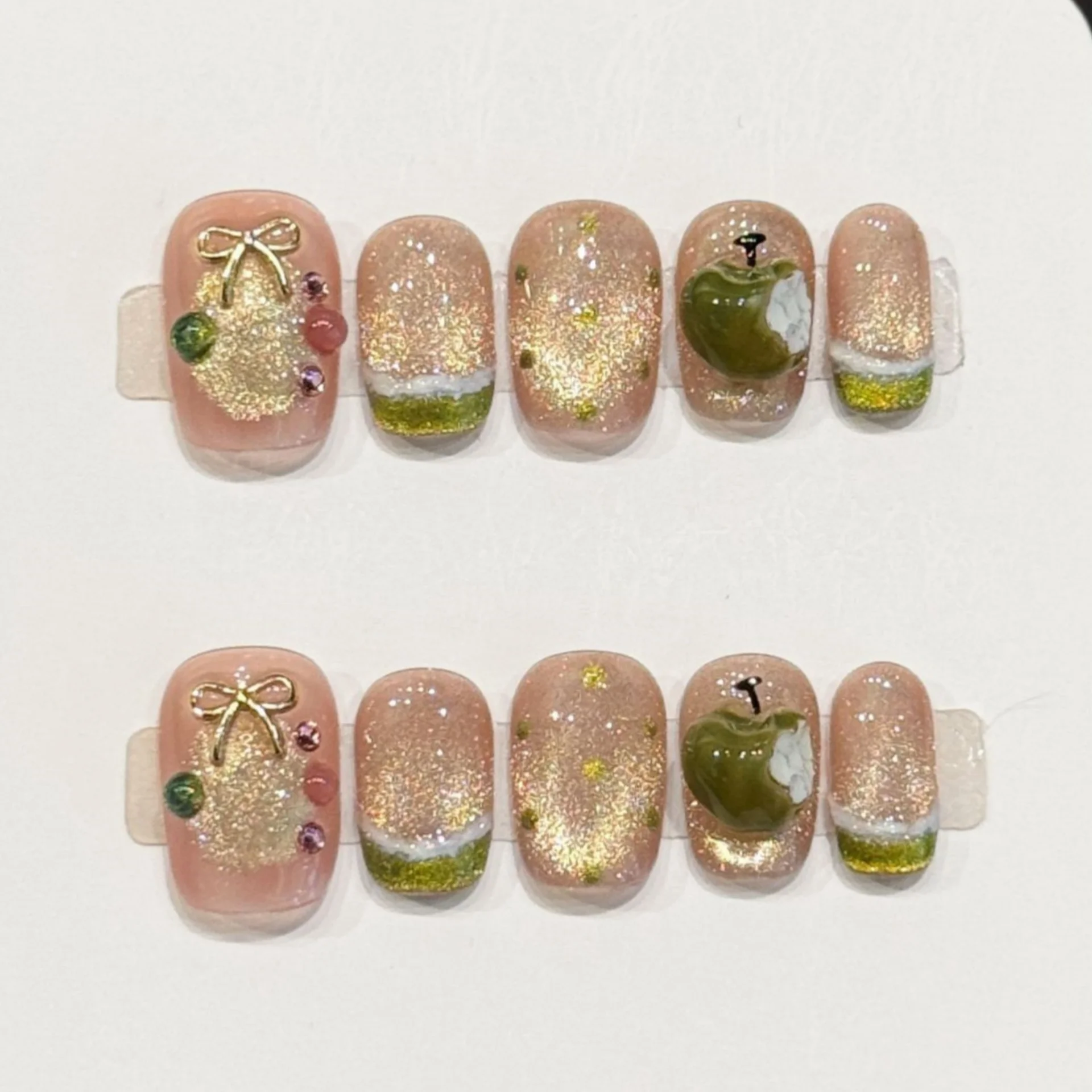10pcs Nude Pink Handmade Press on Nails Tips Glitter Cat's Eye Sweet False Nail Art French Bow Rhinestone Apple Design Fake Nail
10pcs Nude Pink Handmade Press on Nails Tips Glitter Cat's Eye Sweet False Nail Art French Bow Rhinestone Apple Design Fake Nail