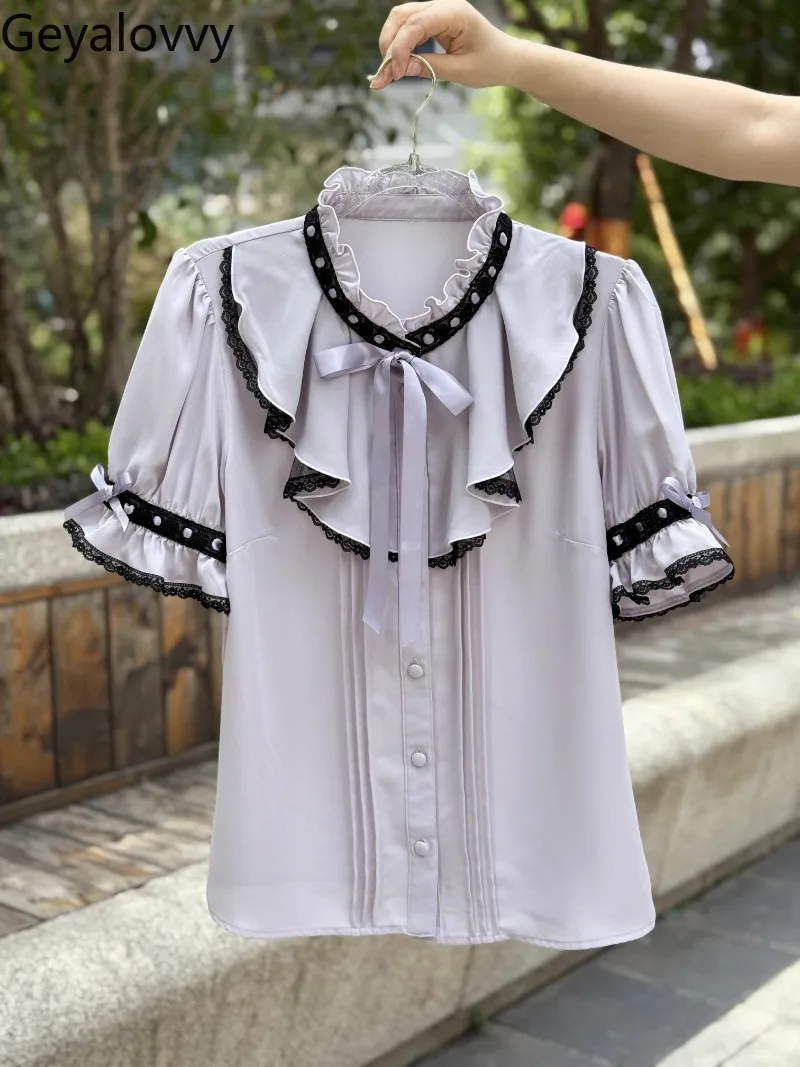 Summer New Short-sleeved Shirt Heavy Industry Lolita Cute Sweet Girls Blouse Wooden Ear Edge Lace Splicing Lace-up Tops
Summer New Short-sleeved Shirt Heavy Industry Lolita Cute Sweet Girls Blouse Wooden Ear Edge Lace Splicing Lace-up Tops