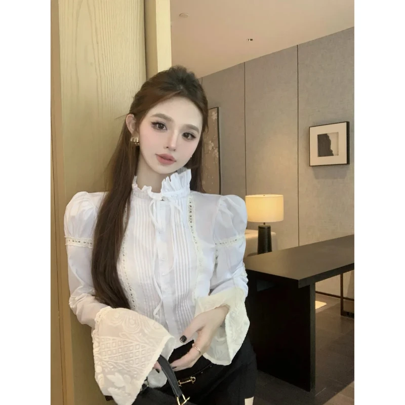 Короткая белая рубашка с рюшами и воротником, женская весенняя милая расклешенная рубашка с полыми крючками и цветочным принтом, корейская шикарная тонкая блузка
Короткая белая рубашка с рюшами и воротником, женская весенняя милая расклешенная рубашка с полыми крючками и цветочным принтом, корейская шикарная тонкая блузка