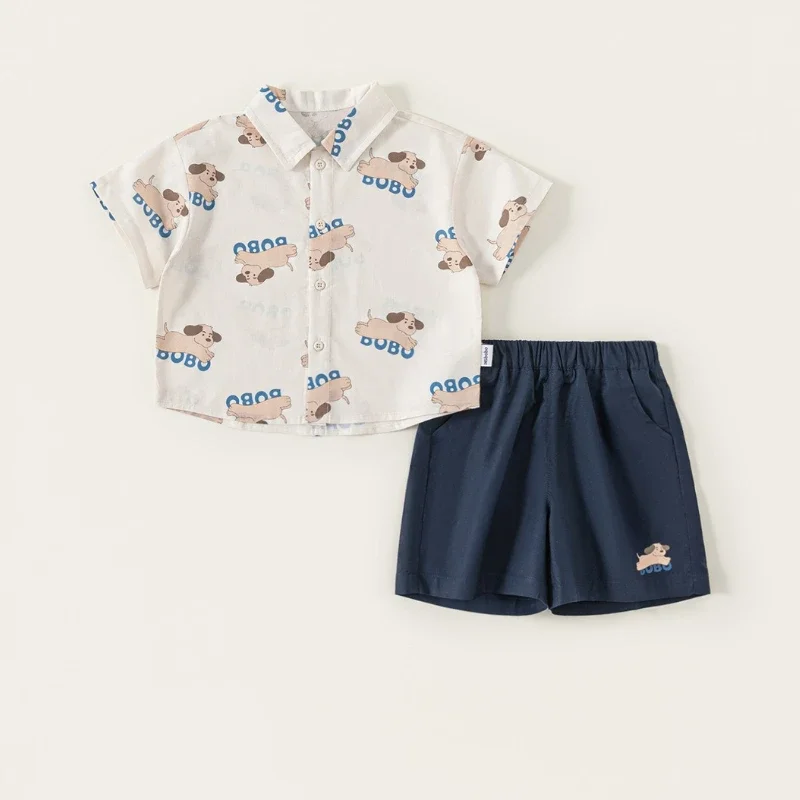 2025 New Summer Children's Collar Cute Dog Print Short Sleeved Shirt and Shorts Two-piece Set
2025 New Summer Children's Collar Cute Dog Print Short Sleeved Shirt and Shorts Two-piece Set