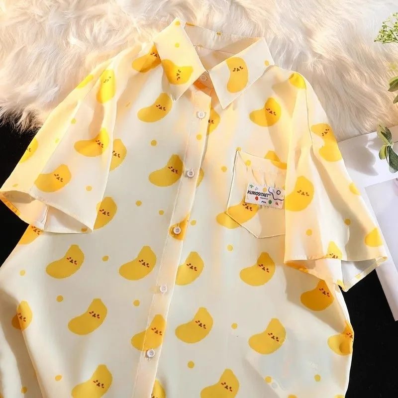 Korean Fashion Casual Loose Short Sleeve Cartoon Print Shirts for Women New Summer Retro Style T-shirt Alphabet Blouse Women
Korean Fashion Casual Loose Short Sleeve Cartoon Print Shirts for Women New Summer Retro Style T-shirt Alphabet Blouse Women