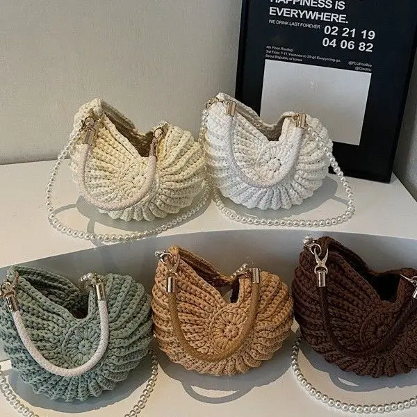 Woven bags, hand-woven bags, conch shells, messenger bags, finished woven handbags, ladies
Woven bags, hand-woven bags, conch shells, messenger bags, finished woven handbags, ladies