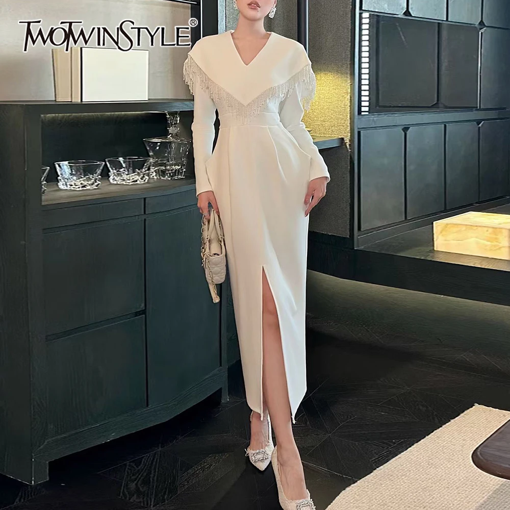 TWOTWINSTYLE Solid Spliced Tassel Dress Female V Neck Long Sleeve Slimming Elegant Temperament Women's Dresses Autumn Fashion
TWOTWINSTYLE Solid Spliced Tassel Dress Female V Neck Long Sleeve Slimming Elegant Temperament Women's Dresses Autumn Fashion