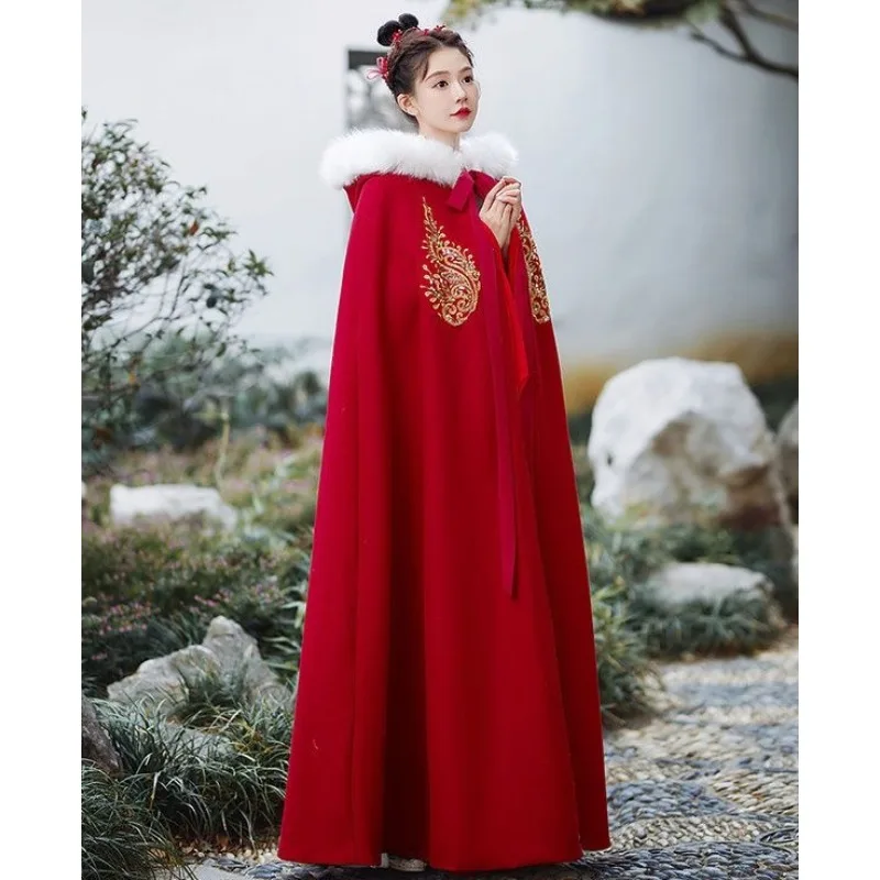 Длинная теплая зимняя куртка для женщин Ярко-красная накидка с меховым воротником и утолщенной флисовой накидкой в древнем стиле с добавлением хлопка
Длинная теплая зимняя куртка для женщин Ярко-красная накидка с меховым воротником и утолщенной флисовой накидкой в древнем стиле с добавлением хлопка