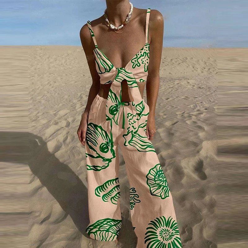 Sexy Sleeveless Hollow Out Tie-up Tops Loose Straight Pants Matching Set Casual Set Summer Pattern Print Beach Vacation 2 Piece
Sexy Sleeveless Hollow Out Tie-up Tops Loose Straight Pants Matching Set Casual Set Summer Pattern Print Beach Vacation 2 Piece