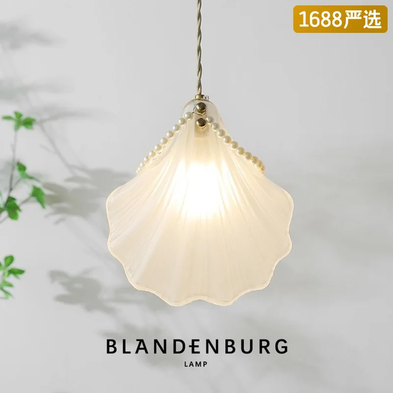 Shell pendant light romantic and warm bedroom headboard LED light French personalized design crystal glass lighting fixture
Shell pendant light romantic and warm bedroom headboard LED light French personalized design crystal glass lighting fixture