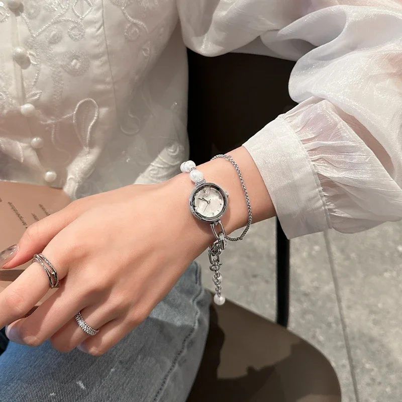 Time Corridor SKHL New Niche Steel Belt Bracelet Small Round Watch Simple Temperament Pearl Fashion Women's Quartz Watch
Time Corridor SKHL New Niche Steel Belt Bracelet Small Round Watch Simple Temperament Pearl Fashion Women's Quartz Watch