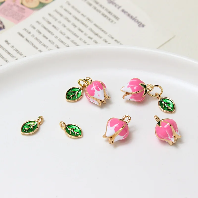 10pcs/ Bag Copper gold-plated oil drop pink peach blossom small leaves bud pendant diy earrings bracelet making accessories
10pcs/ Bag Copper gold-plated oil drop pink peach blossom small leaves bud pendant diy earrings bracelet making accessories
