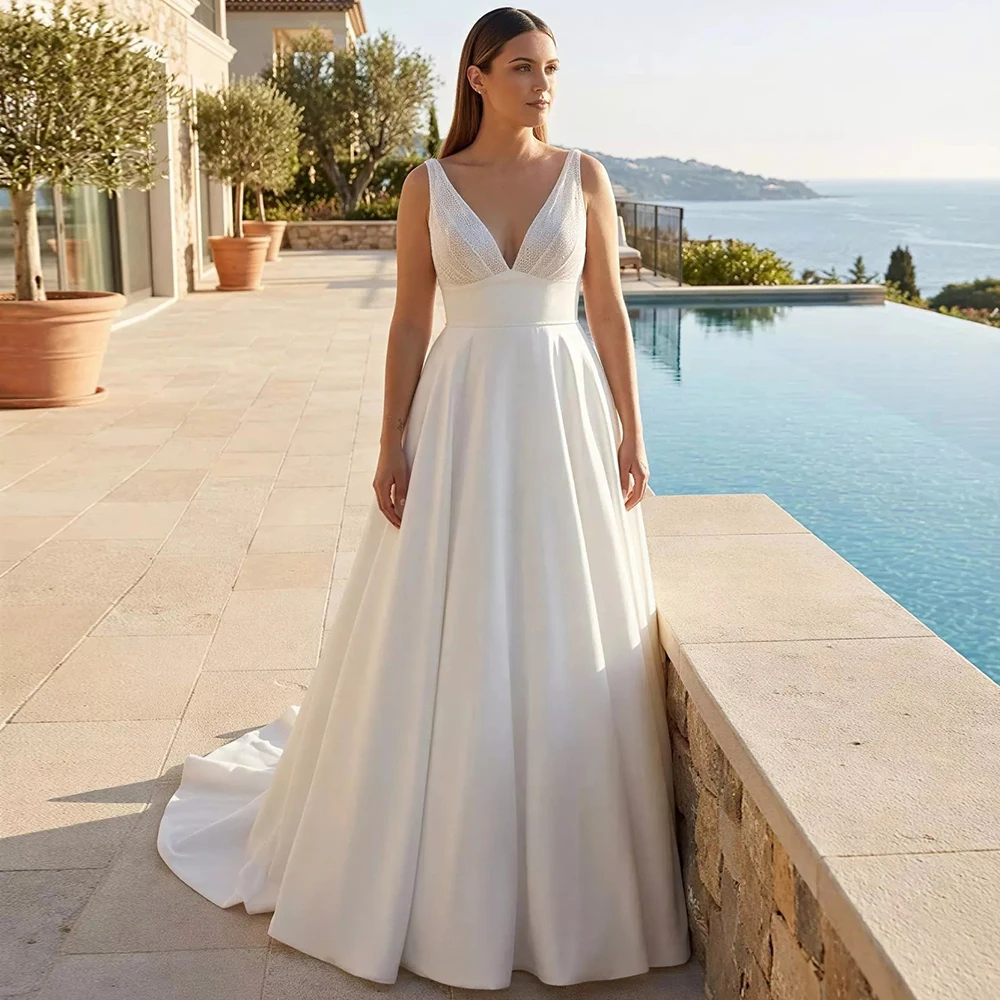 Sexy A-Line Lace Deep V-Neck Wedding Dress for Brides High Quality Customized Sleeveless Jersey Bridal Gowns vestido de novia
Sexy A-Line Lace Deep V-Neck Wedding Dress for Brides High Quality Customized Sleeveless Jersey Bridal Gowns vestido de novia