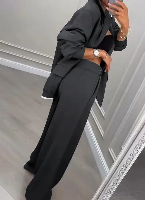 Женский городской профессиональный комплект из двух предметов, свободный пиджак в сочетании с широкими брюками, качественная рабочая одежда
Женский городской профессиональный комплект из двух предметов, свободный пиджак в сочетании с широкими брюками, качественная рабочая одежда