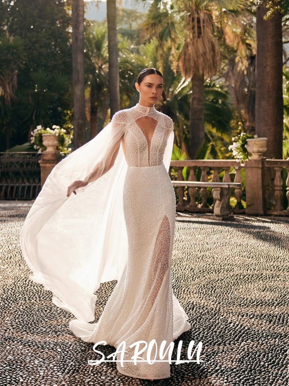 Exquisite Pearls Mermaid Wedding Dress With Cape Dazzling Sexy Backless Customized Bridal Gown Stunning Women Formal Bridal Gown
Exquisite Pearls Mermaid Wedding Dress With Cape Dazzling Sexy Backless Customized Bridal Gown Stunning Women Formal Bridal Gown