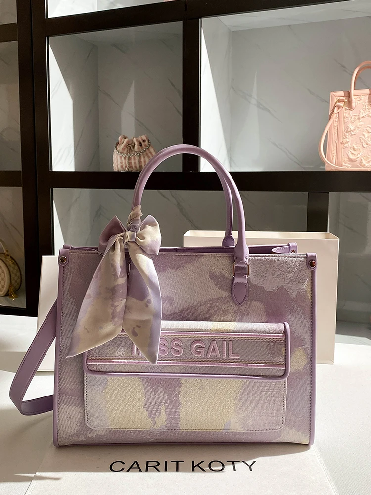 Sweet and Luxury Handbag with Exquisite Embroidery Letter Printing Women's New Fashion Tote Bag with Large Capacity for Shopping
Sweet and Luxury Handbag with Exquisite Embroidery Letter Printing Women's New Fashion Tote Bag with Large Capacity for Shopping