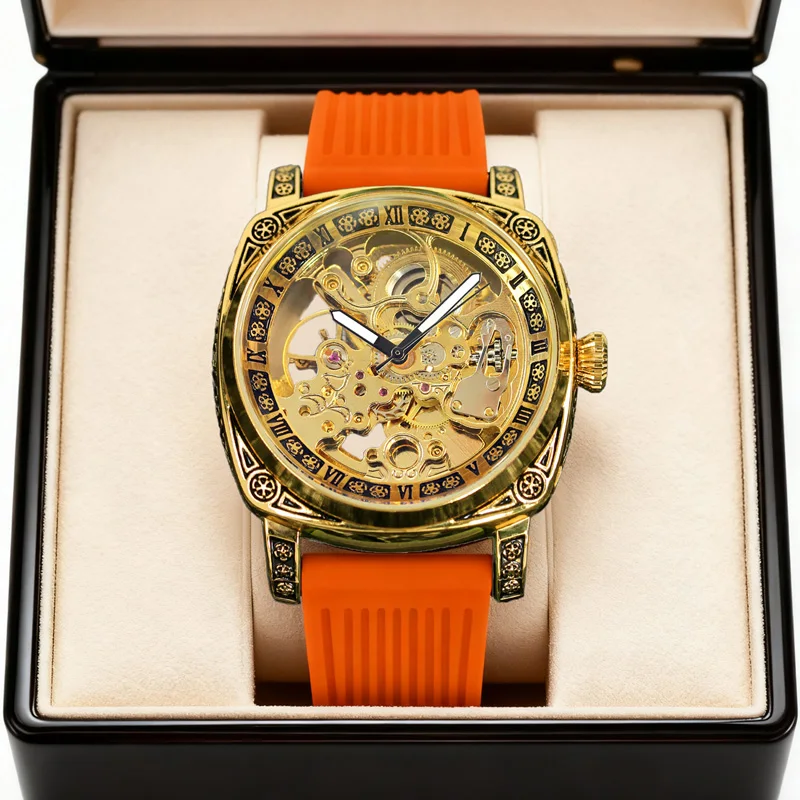 Мужские золотые повседневные модные механические часы с привлекательным полым дизайном с тонкой гравировкой и оранжевым резиновым ремешком.
Мужские золотые повседневные модные механические часы с привлекательным полым дизайном с тонкой гравировкой и оранжевым резиновым ремешком.