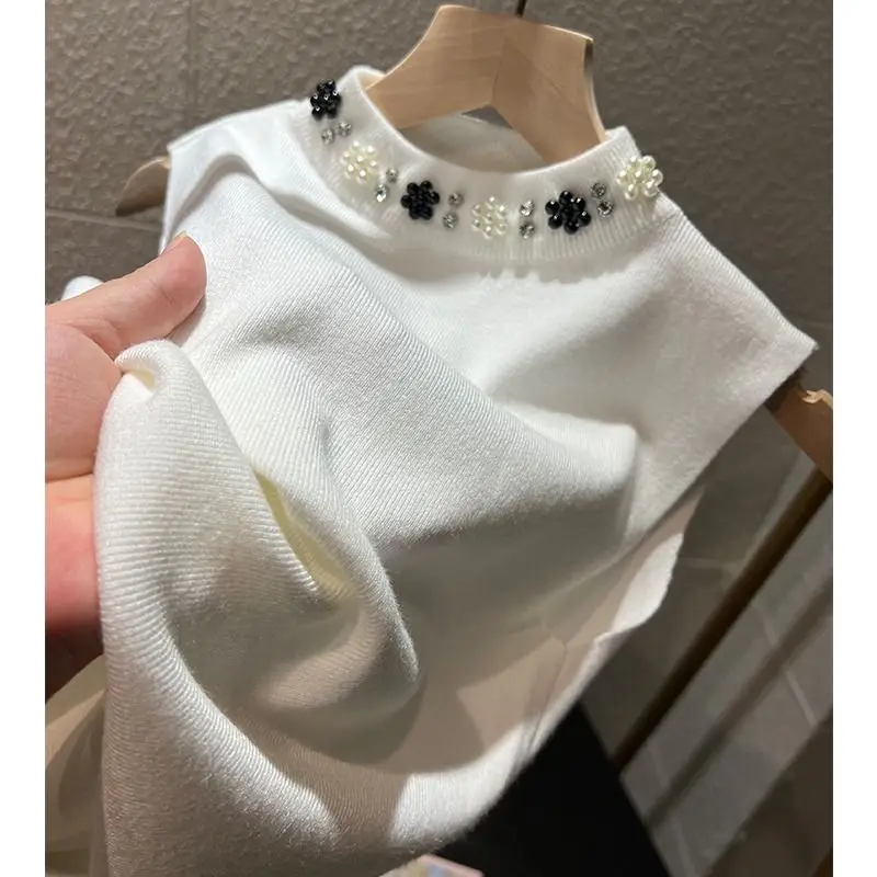 Women Clothing Trendy Half High Collar Beaded Luxury Chic Knitted Vest Tanks Top Solid Sleeveless Slim Commute Basic Tank Tops
Women Clothing Trendy Half High Collar Beaded Luxury Chic Knitted Vest Tanks Top Solid Sleeveless Slim Commute Basic Tank Tops