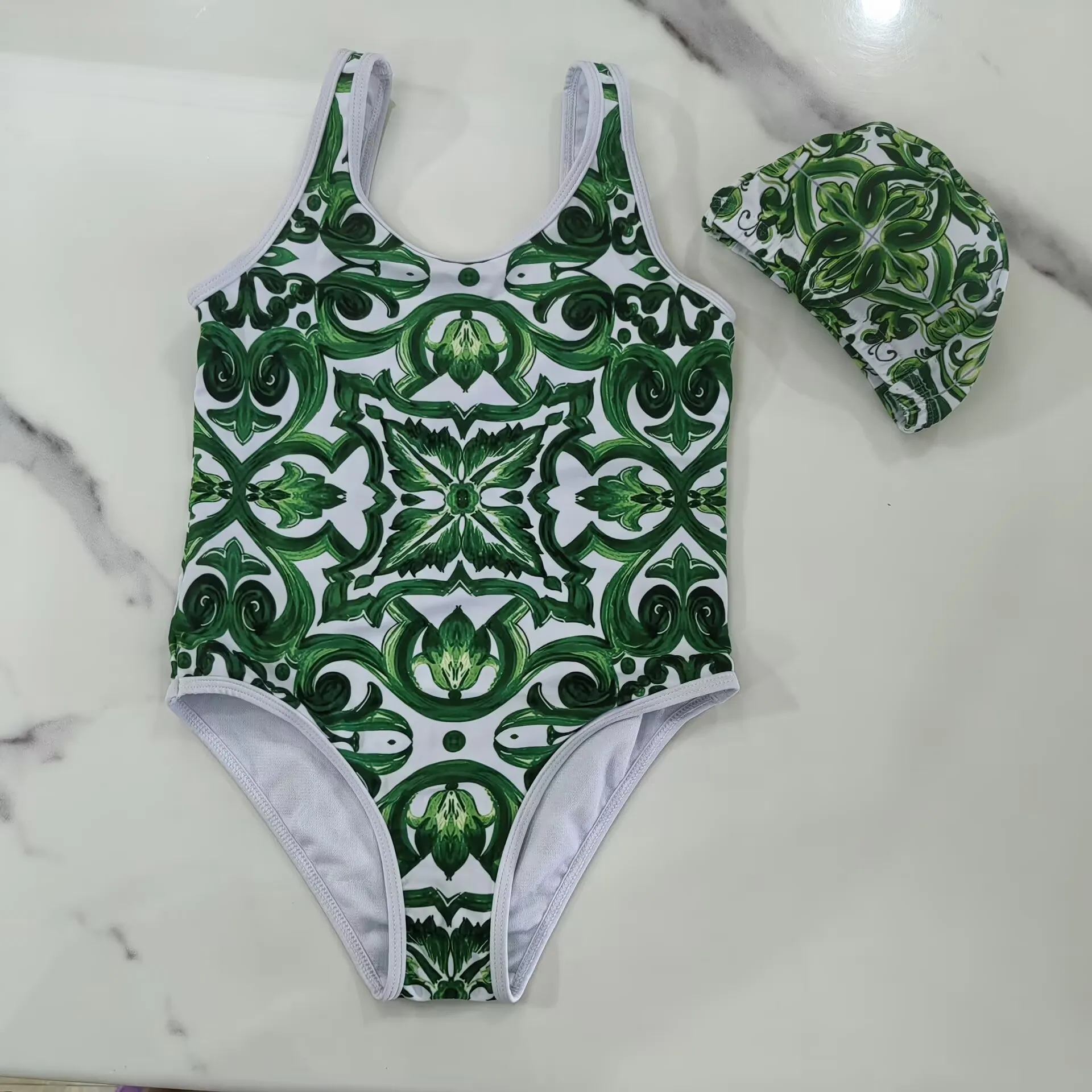 2026 New Children's swimsuit Green Floral Pattern One Piece Swimsuit With Swim Cap For Girls toddler baby girl bathing suit
2026 New Children's swimsuit Green Floral Pattern One Piece Swimsuit With Swim Cap For Girls toddler baby girl bathing suit