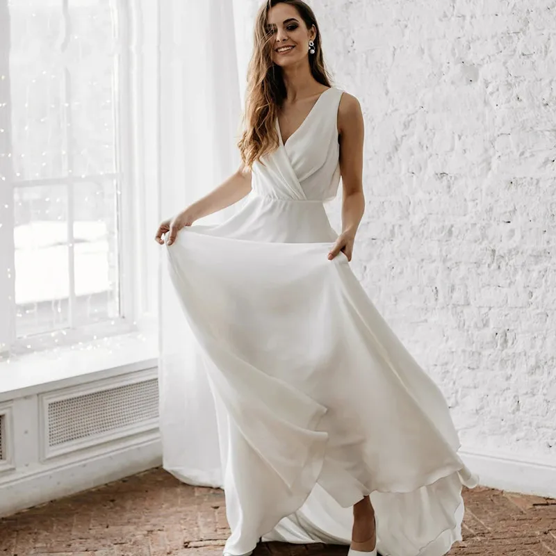 Elegant Wedding Dress Lace Applique V-Neck Simple A-line Bridal Gowns Satin Chiffon White Backless Marry dress Summer 2023
Elegant Wedding Dress Lace Applique V-Neck Simple A-line Bridal Gowns Satin Chiffon White Backless Marry dress Summer 2023