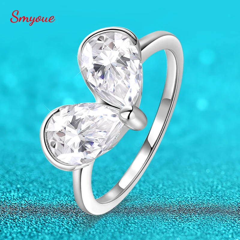 Кольцо Smyoue с муассанитом 1.5 карата (6*9 мм) в форме груши для женщин, 2 камня, роскошное ювелирное изделие, обручальное кольцо с лабораторным бриллиантом, 100% стерлинговое серебро S925
Кольцо Smyoue с муассанитом 1.5 карата (6*9 мм) в форме груши для женщин, 2 камня, роскошное ювелирное изделие, обручальное кольцо с лабораторным бриллиантом, 100% стерлинговое серебро S925