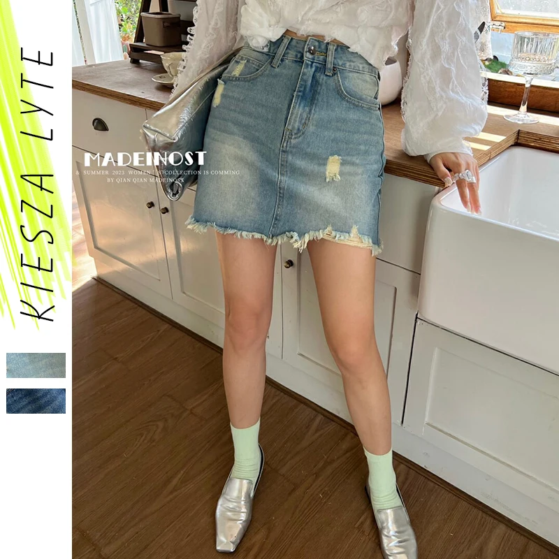2024 Street Style Denim Mini Skirt for Women with Vintage Distressed Design, High Waist, and Figure-Flattering A-line Cut
2024 Street Style Denim Mini Skirt for Women with Vintage Distressed Design, High Waist, and Figure-Flattering A-line Cut