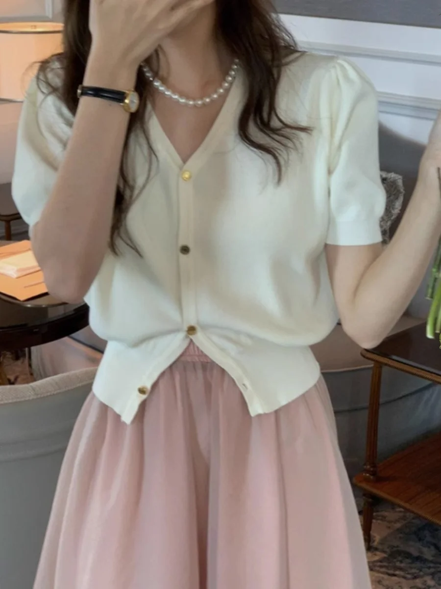 Bla Ice Silk Knitted ort Sve Open Cardigan Women's Summer Slim Fit ort Length V-Ne T-irt Thin Korean Sle Top
Bla Ice Silk Knitted ort Sve Open Cardigan Women's Summer Slim Fit ort Length V-Ne T-irt Thin Korean Sle Top