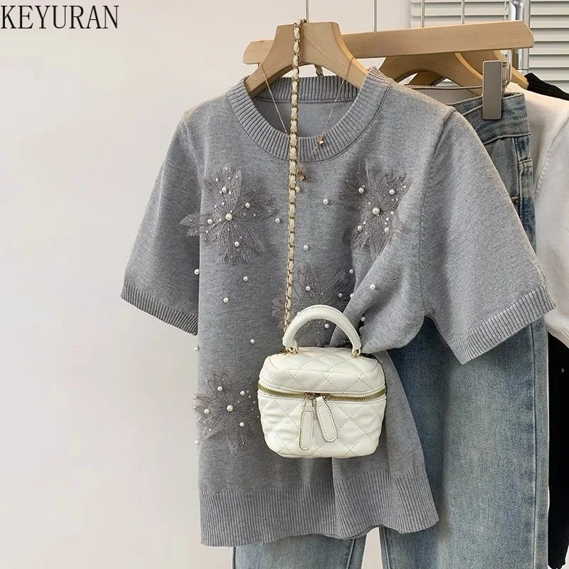 2025 Summer 3D Flower Peals Beading Knit T-shirts Women Vitnage Fashion Short Sleeve O-neck Casual Knitwear Tops Ladies Tees
2025 Summer 3D Flower Peals Beading Knit T-shirts Women Vitnage Fashion Short Sleeve O-neck Casual Knitwear Tops Ladies Tees