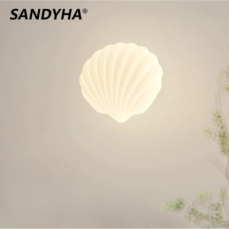 Modern Minimalist Shell Wall Lamp Creative Cream Wind Leaf Bedlight LED Lighting Fixture For Bedroom Living Room Home Decoration
Modern Minimalist Shell Wall Lamp Creative Cream Wind Leaf Bedlight LED Lighting Fixture For Bedroom Living Room Home Decoration