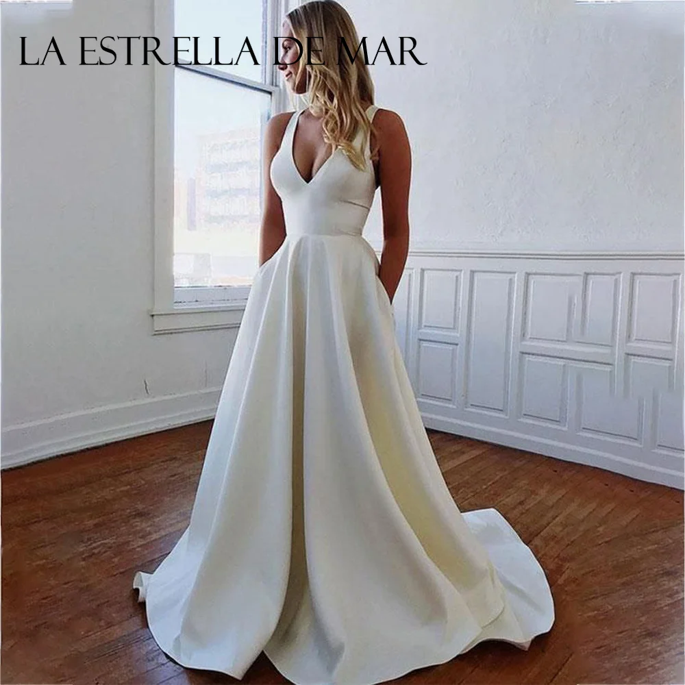 Women A Line Satin Bridal Gowns with Pockets Sexy Backless Wedding Dresses Elegant Abendkleider Hochzeit Hot Vestidos Novias
Women A Line Satin Bridal Gowns with Pockets Sexy Backless Wedding Dresses Elegant Abendkleider Hochzeit Hot Vestidos Novias