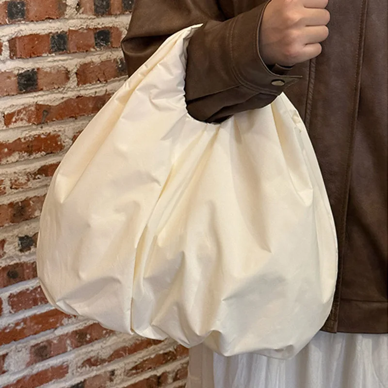 Spring and Summer Fashion New Discount Solid Designer Women's Tote Bag 2025 Casual Y2K Aesthetic Nylon Lightweight Commuter Bag
Spring and Summer Fashion New Discount Solid Designer Women's Tote Bag 2025 Casual Y2K Aesthetic Nylon Lightweight Commuter Bag