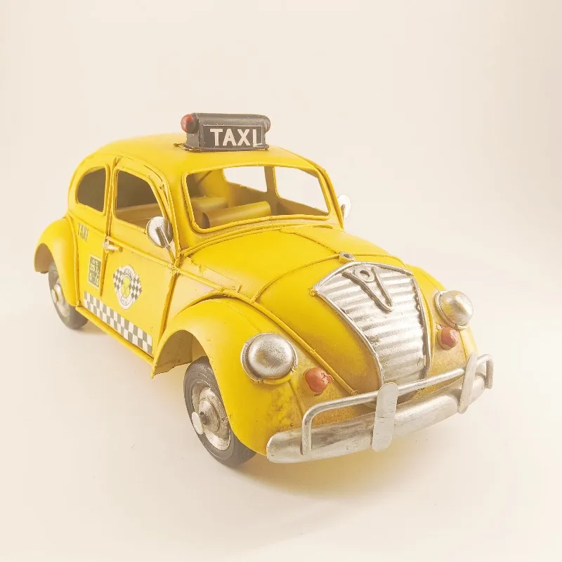 Vintage yellow taxi figurine handmade classic metal car model cast iron home office decoration 
Vintage yellow taxi figurine handmade classic metal car model cast iron home office decoration
