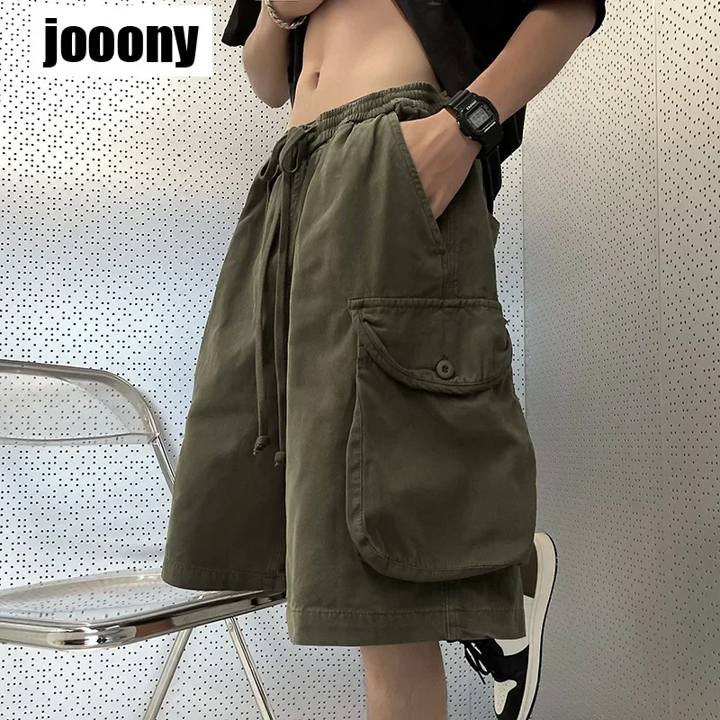 Винтажные простые широкие однотонные полубрюки, свободные повседневные брюки, мужские летние шорты-карго с завязками, модная уличная одежда в корейском стиле
Винтажные простые широкие однотонные полубрюки, свободные повседневные брюки, мужские летние шорты-карго с завязками, модная уличная одежда в корейском стиле