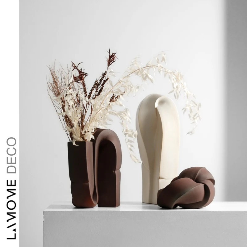 minimalist geometric distortion art ceramic flower ware, brownish red ornaments, sales office decoration
minimalist geometric distortion art ceramic flower ware, brownish red ornaments, sales office decoration