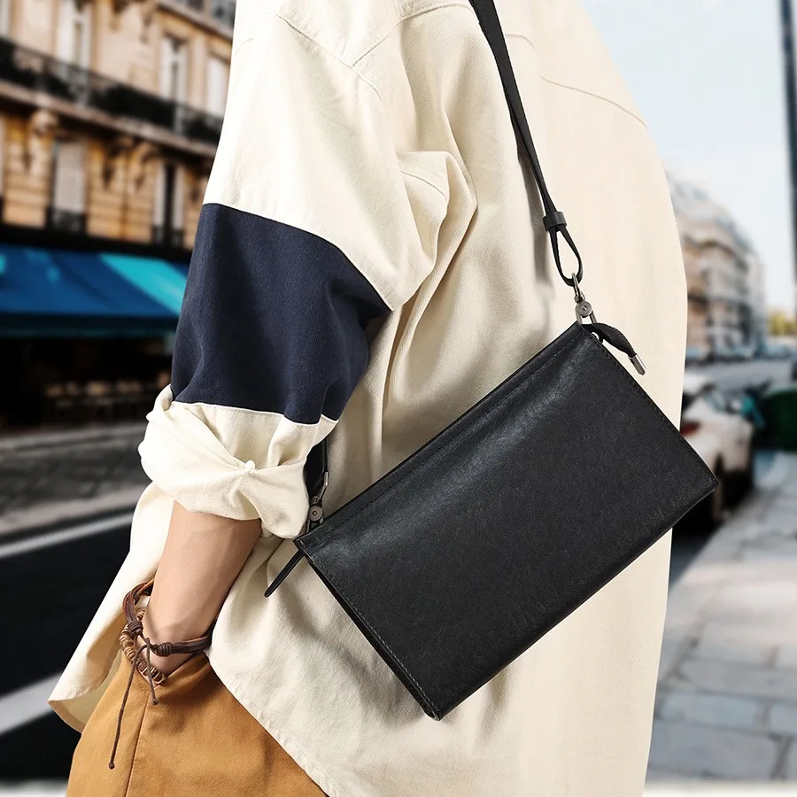 Cowhide casual trendy brand shoulder leather high-end men's messenger bag multi-functional business clutch bag fashion accessori
Cowhide casual trendy brand shoulder leather high-end men's messenger bag multi-functional business clutch bag fashion accessori