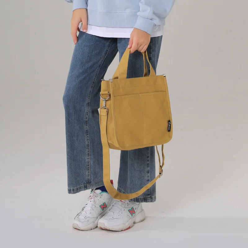2025 Retro Solid Color Canvas Tote Bag, Vintage Crossbody Purse for Women, Compact Boho Handheld Shoulder Bag
2025 Retro Solid Color Canvas Tote Bag, Vintage Crossbody Purse for Women, Compact Boho Handheld Shoulder Bag